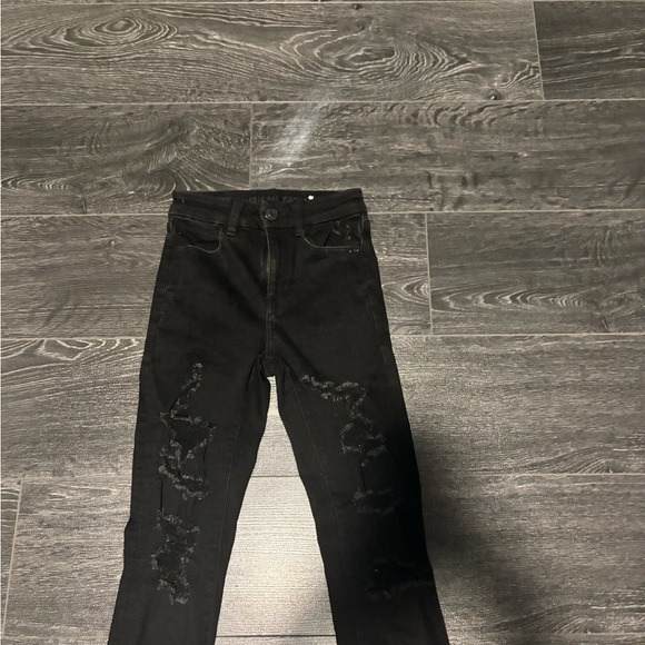 American Eagle black ripped “next level stretch” skinny jeans. Size 00 - Picture 3 of 7